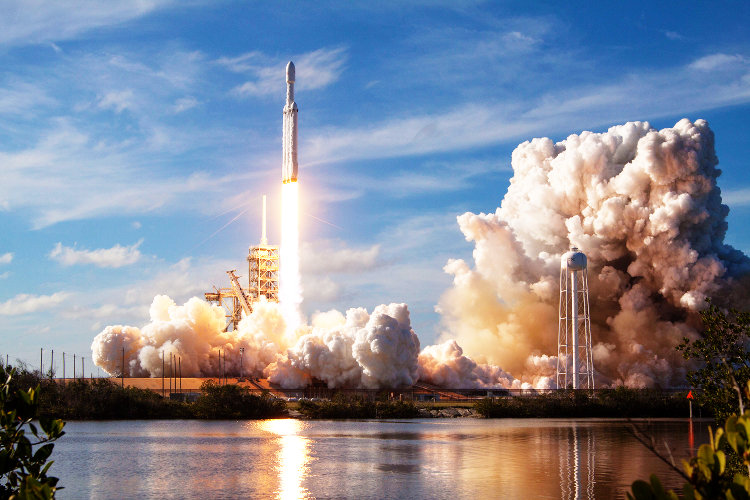 A rocket launches into space